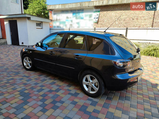 Сірий Мазда 3, об'ємом двигуна 1.6 л та пробігом 275 тис. км за 4950 $, фото 2 на Automoto.ua
