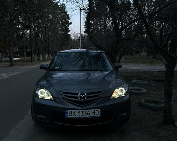 Серый Мазда 3, объемом двигателя 2 л и пробегом 298 тыс. км за 5600 $, фото 4 на Automoto.ua