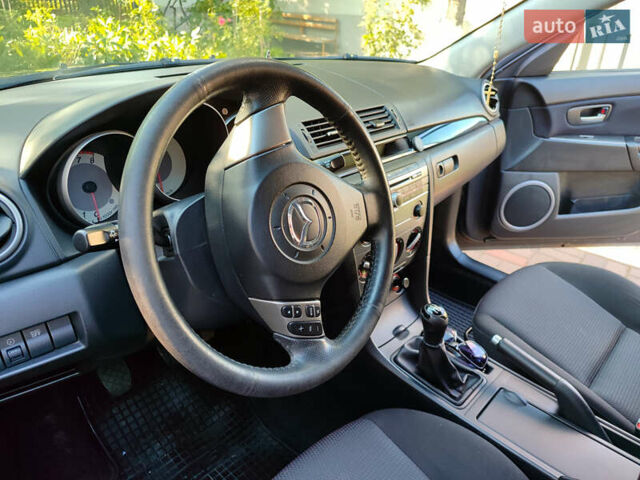 Сірий Мазда 3, об'ємом двигуна 1.6 л та пробігом 275 тис. км за 4950 $, фото 13 на Automoto.ua
