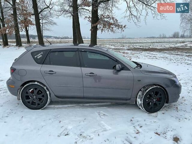 Серый Мазда 3, объемом двигателя 1.6 л и пробегом 320 тыс. км за 7999 $, фото 3 на Automoto.ua