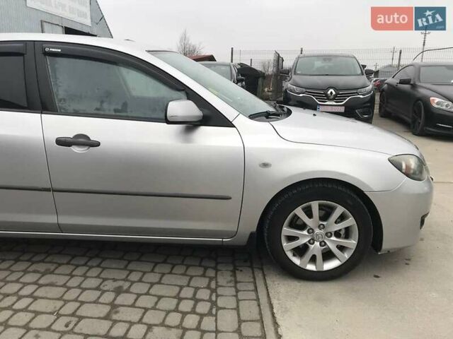 Серый Мазда 3, объемом двигателя 1.6 л и пробегом 220 тыс. км за 5090 $, фото 12 на Automoto.ua