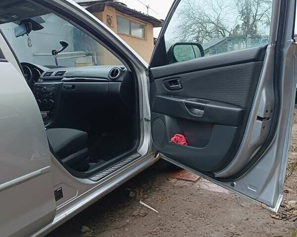 Серый Мазда 3, объемом двигателя 1.6 л и пробегом 195 тыс. км за 5000 $, фото 6 на Automoto.ua