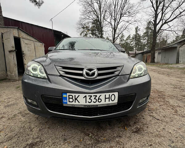 Серый Мазда 3, объемом двигателя 2 л и пробегом 298 тыс. км за 5600 $, фото 6 на Automoto.ua