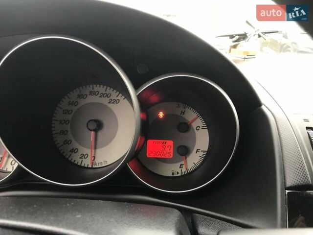 Серый Мазда 3, объемом двигателя 1.6 л и пробегом 220 тыс. км за 5090 $, фото 4 на Automoto.ua