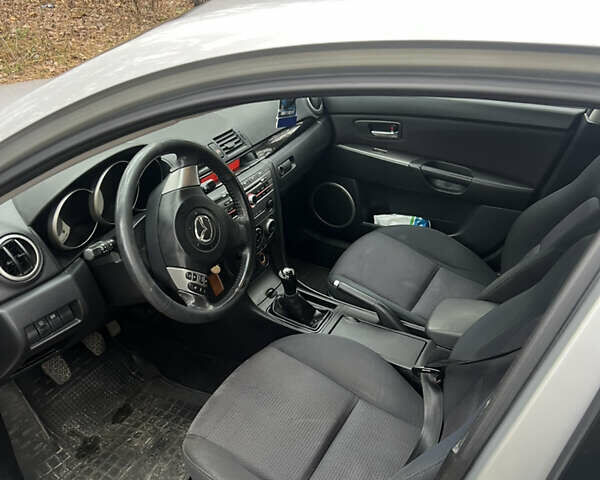 Серый Мазда 3, объемом двигателя 1.6 л и пробегом 217 тыс. км за 4300 $, фото 10 на Automoto.ua