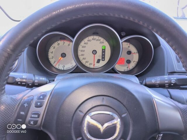 Серый Мазда 3, объемом двигателя 1.6 л и пробегом 185 тыс. км за 4200 $, фото 5 на Automoto.ua