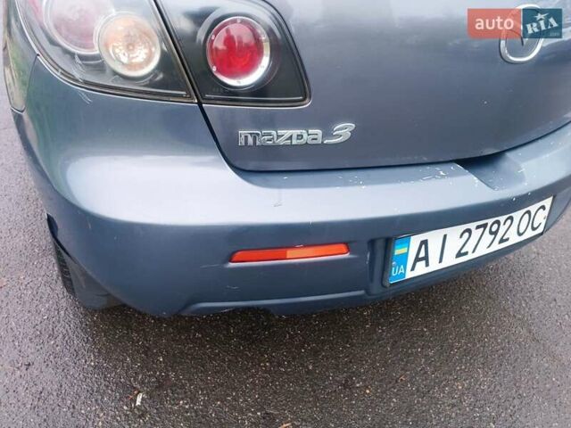 Серый Мазда 3, объемом двигателя 1.56 л и пробегом 269 тыс. км за 5200 $, фото 5 на Automoto.ua
