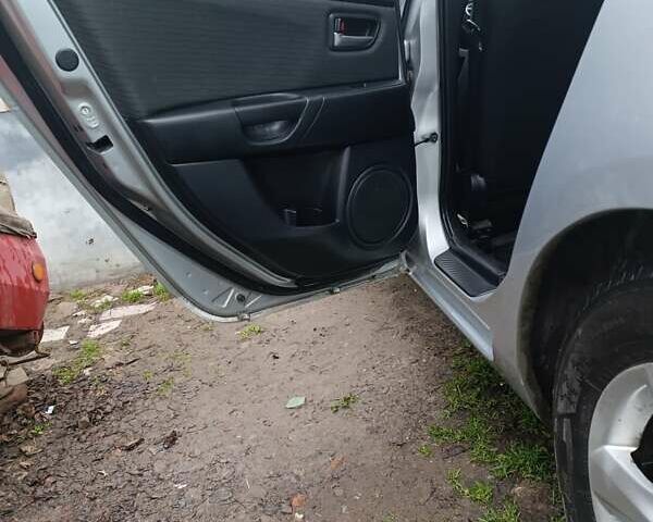 Серый Мазда 3, объемом двигателя 1.6 л и пробегом 195 тыс. км за 5000 $, фото 10 на Automoto.ua