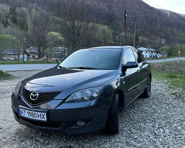 Серый Мазда 3, объемом двигателя 1.6 л и пробегом 248 тыс. км за 4600 $, фото 1 на Automoto.ua