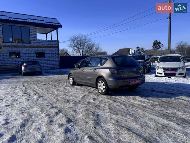 Серый Мазда 3, объемом двигателя 1.4 л и пробегом 240 тыс. км за 5590 $, фото 16 на Automoto.ua