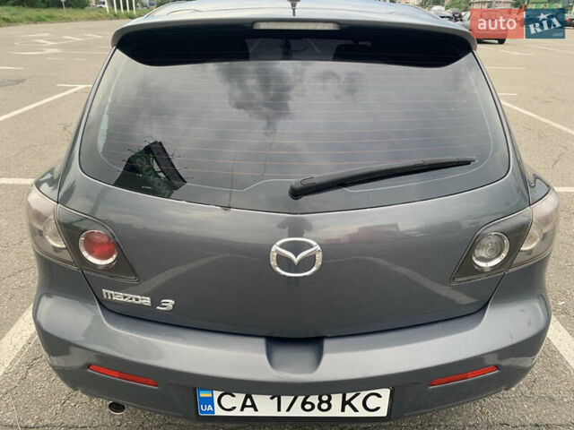 Сірий Мазда 3, об'ємом двигуна 1.6 л та пробігом 263 тис. км за 4500 $, фото 5 на Automoto.ua