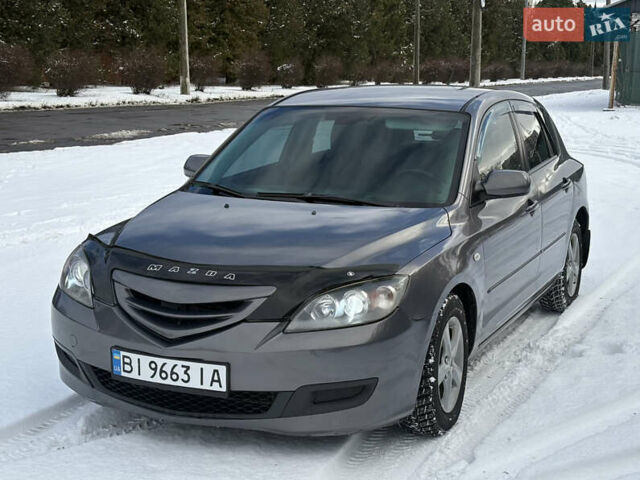 Серый Мазда 3, объемом двигателя 1.6 л и пробегом 200 тыс. км за 5999 $, фото 1 на Automoto.ua