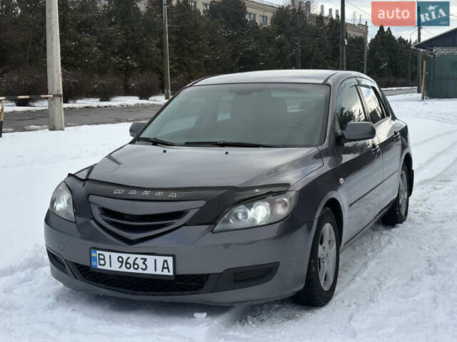 Серый Мазда 3, объемом двигателя 1.6 л и пробегом 200 тыс. км за 5999 $, фото 8 на Automoto.ua