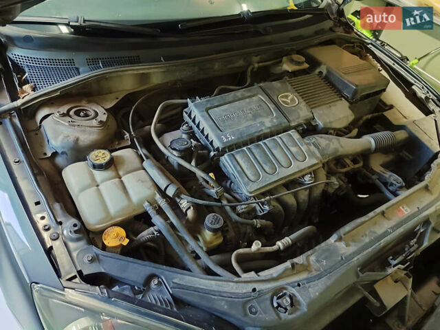 Сірий Мазда 3, об'ємом двигуна 1.6 л та пробігом 275 тис. км за 4950 $, фото 16 на Automoto.ua