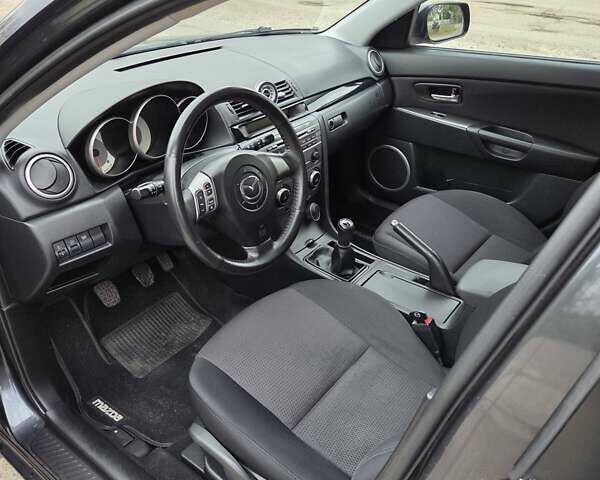 Мазда 3 2007 в Черкассах на Automoto.ua Серый Мазда 3, объемом двигателя 1.6 л и пробегом 251 тыс. км за 6100 $, фото 16 на Automoto.ua