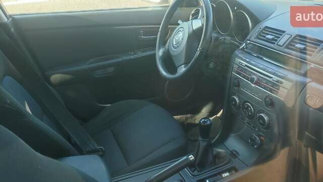 Серый Мазда 3, объемом двигателя 1.6 л и пробегом 228 тыс. км за 3850 $, фото 2 на Automoto.ua