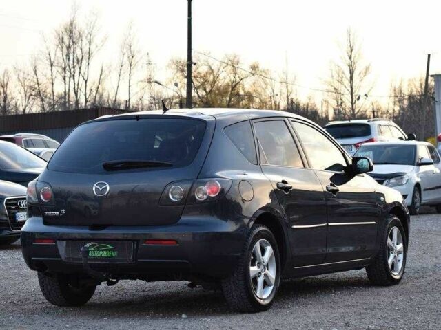 Серый Мазда 3, объемом двигателя 1.6 л и пробегом 246 тыс. км за 4550 $, фото 1 на Automoto.ua
