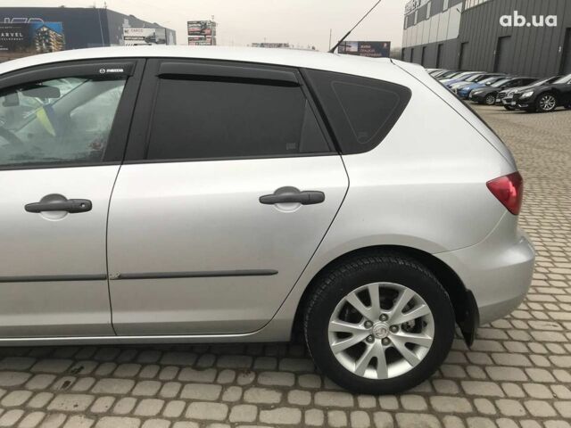 Серый Мазда 3, объемом двигателя 1.6 л и пробегом 220 тыс. км за 5090 $, фото 17 на Automoto.ua