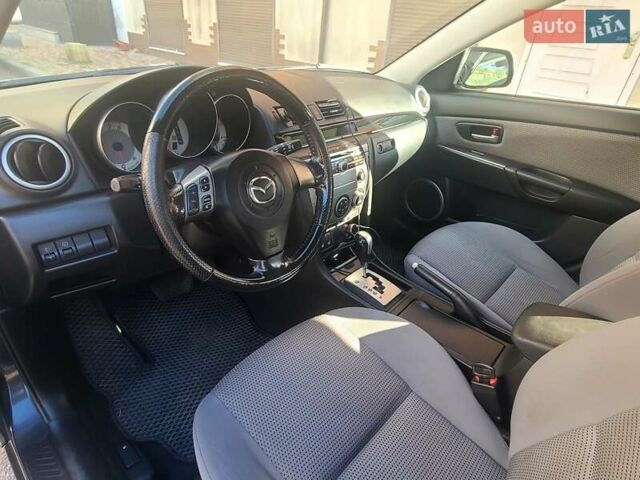 Серый Мазда 3, объемом двигателя 1.6 л и пробегом 214 тыс. км за 6900 $, фото 4 на Automoto.ua