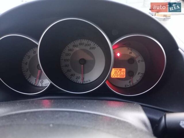 Серый Мазда 3, объемом двигателя 1.6 л и пробегом 229 тыс. км за 5200 $, фото 4 на Automoto.ua