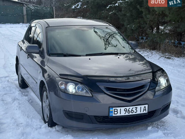 Серый Мазда 3, объемом двигателя 1.6 л и пробегом 200 тыс. км за 5999 $, фото 12 на Automoto.ua