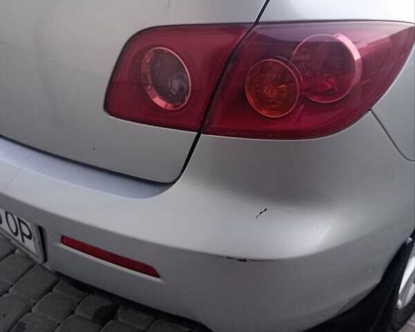 Серый Мазда 3, объемом двигателя 1.6 л и пробегом 229 тыс. км за 5200 $, фото 10 на Automoto.ua