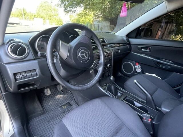Серый Мазда 3, объемом двигателя 1.6 л и пробегом 255 тыс. км за 4800 $, фото 5 на Automoto.ua
