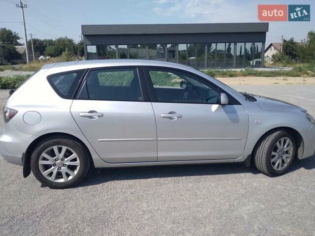 Серый Мазда 3, объемом двигателя 1.6 л и пробегом 230 тыс. км за 4900 $, фото 1 на Automoto.ua
