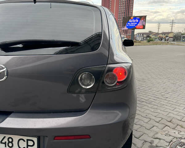 Серый Мазда 3, объемом двигателя 1.6 л и пробегом 268 тыс. км за 5400 $, фото 18 на Automoto.ua
