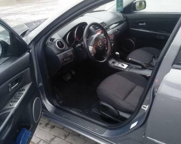 Серый Мазда 3, объемом двигателя 1.6 л и пробегом 128 тыс. км за 4850 $, фото 12 на Automoto.ua