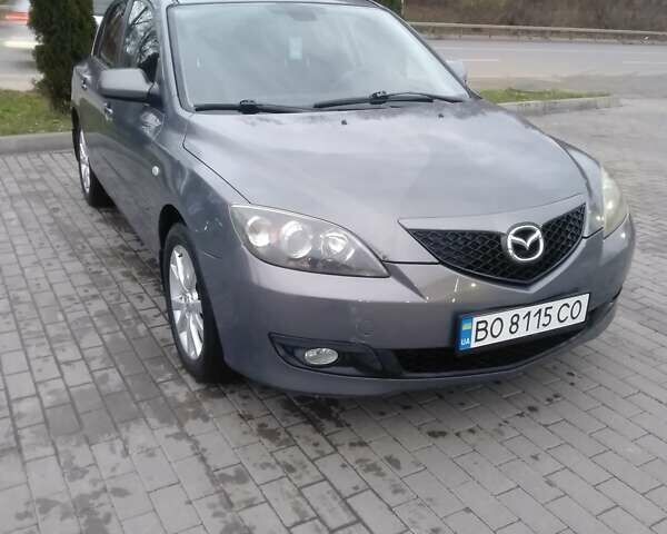 Серый Мазда 3, объемом двигателя 1.6 л и пробегом 128 тыс. км за 4850 $, фото 2 на Automoto.ua