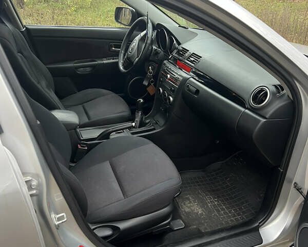 Серый Мазда 3, объемом двигателя 1.6 л и пробегом 217 тыс. км за 4300 $, фото 12 на Automoto.ua