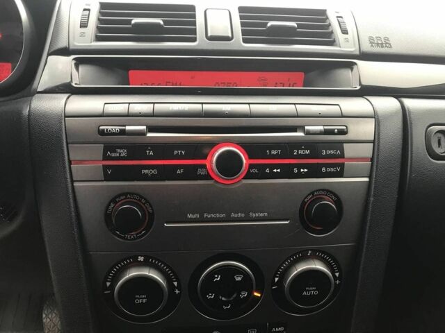 Серый Мазда 3, объемом двигателя 1.6 л и пробегом 220 тыс. км за 5090 $, фото 3 на Automoto.ua