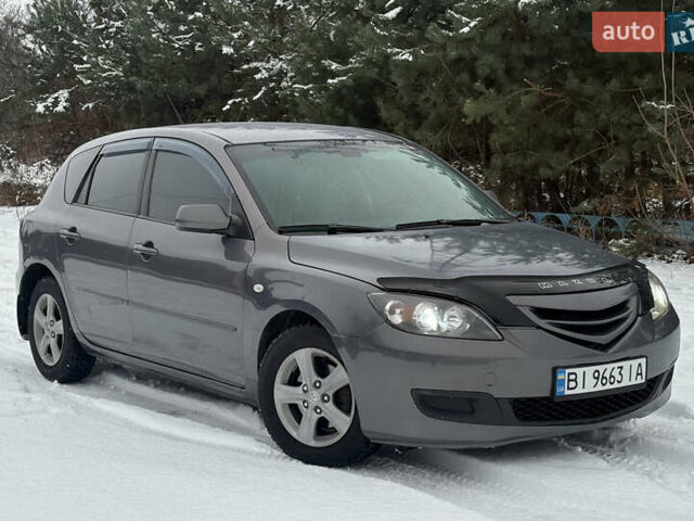 Серый Мазда 3, объемом двигателя 1.6 л и пробегом 200 тыс. км за 5999 $, фото 14 на Automoto.ua