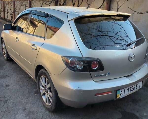 Серый Мазда 3, объемом двигателя 1.6 л и пробегом 185 тыс. км за 5999 $, фото 1 на Automoto.ua
