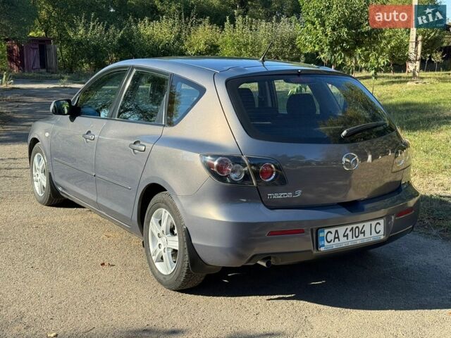 Сірий Мазда 3, об'ємом двигуна 1.6 л та пробігом 215 тис. км за 6100 $, фото 4 на Automoto.ua