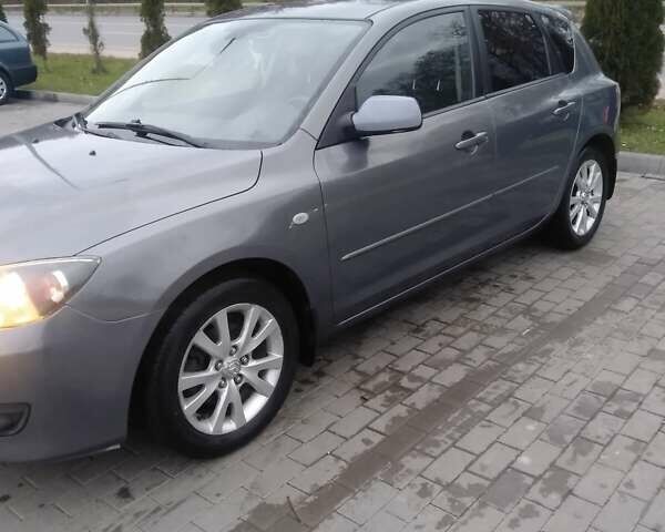 Серый Мазда 3, объемом двигателя 1.6 л и пробегом 128 тыс. км за 4850 $, фото 5 на Automoto.ua