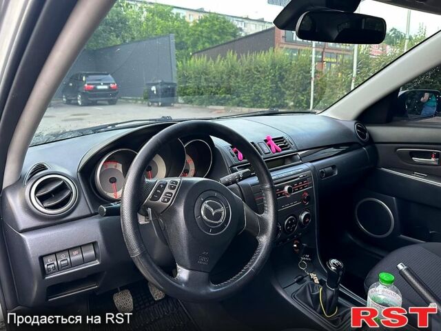 Серый Мазда 3, объемом двигателя 1.6 л и пробегом 31500 тыс. км за 4700 $, фото 4 на Automoto.ua