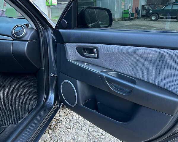 Серый Мазда 3, объемом двигателя 1.6 л и пробегом 248 тыс. км за 4600 $, фото 19 на Automoto.ua