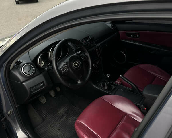 Серый Мазда 3, объемом двигателя 1.6 л и пробегом 268 тыс. км за 5400 $, фото 6 на Automoto.ua