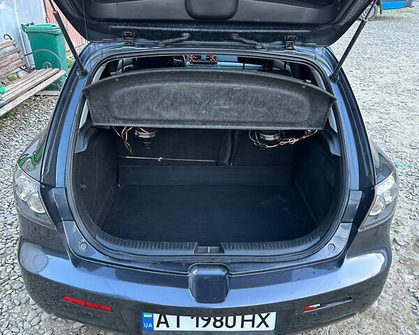 Серый Мазда 3, объемом двигателя 1.6 л и пробегом 248 тыс. км за 4600 $, фото 25 на Automoto.ua