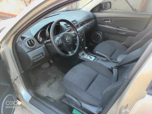 Серый Мазда 3, объемом двигателя 1.6 л и пробегом 185 тыс. км за 4200 $, фото 7 на Automoto.ua