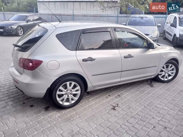 Серый Мазда 3, объемом двигателя 1.6 л и пробегом 229 тыс. км за 5200 $, фото 3 на Automoto.ua