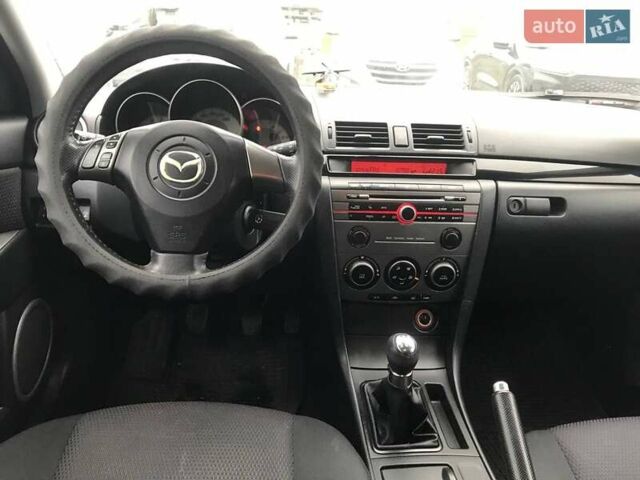 Серый Мазда 3, объемом двигателя 1.6 л и пробегом 220 тыс. км за 5090 $, фото 6 на Automoto.ua
