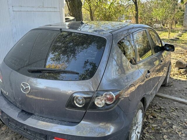 Серый Мазда 3, объемом двигателя 1.6 л и пробегом 3 тыс. км за 2500 $, фото 1 на Automoto.ua