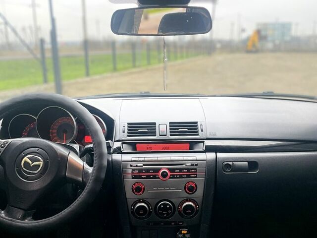 Серый Мазда 3, объемом двигателя 1.6 л и пробегом 29000 тыс. км за 4800 $, фото 10 на Automoto.ua