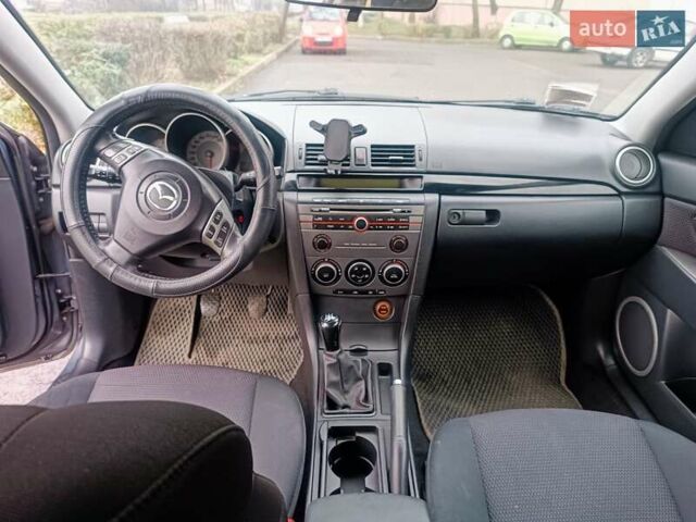 Серый Мазда 3, объемом двигателя 1.56 л и пробегом 269 тыс. км за 5200 $, фото 19 на Automoto.ua