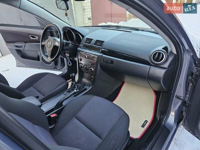 Сірий Мазда 3, об'ємом двигуна 1.6 л та пробігом 289 тис. км за 5300 $, фото 79 на Automoto.ua