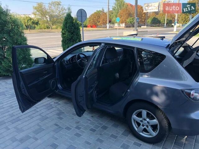 Сірий Мазда 3, об'ємом двигуна 1.6 л та пробігом 255 тис. км за 4900 $, фото 9 на Automoto.ua