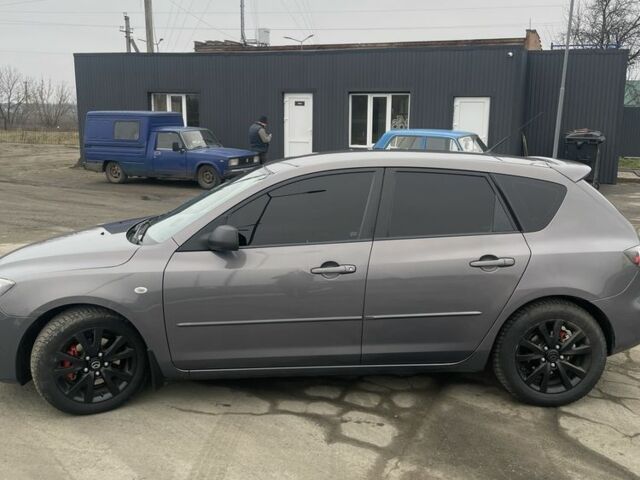 Серый Мазда 3, объемом двигателя 1.6 л и пробегом 290 тыс. км за 4999 $, фото 5 на Automoto.ua